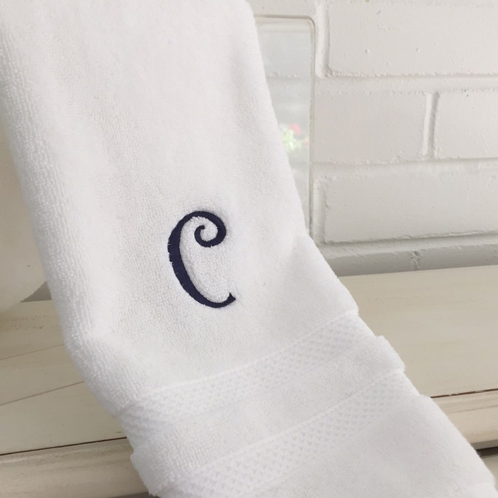 Embroidered (C) hand towel. Initial C. White hand towel. Initialed hand towel